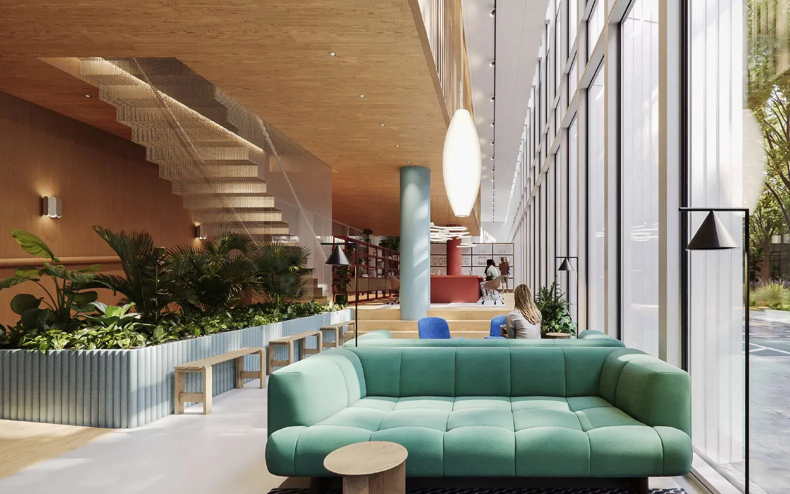 Spaces Zuidas: a green sofa in front of a planted stair and a double-height glazed wall