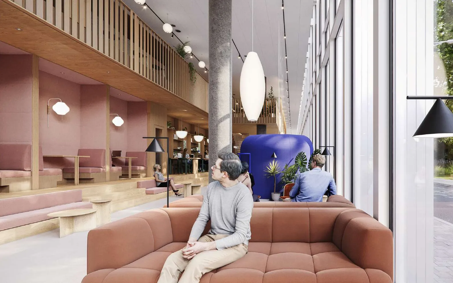 Pink banquettes and a terracotta sofa along the glazed wall